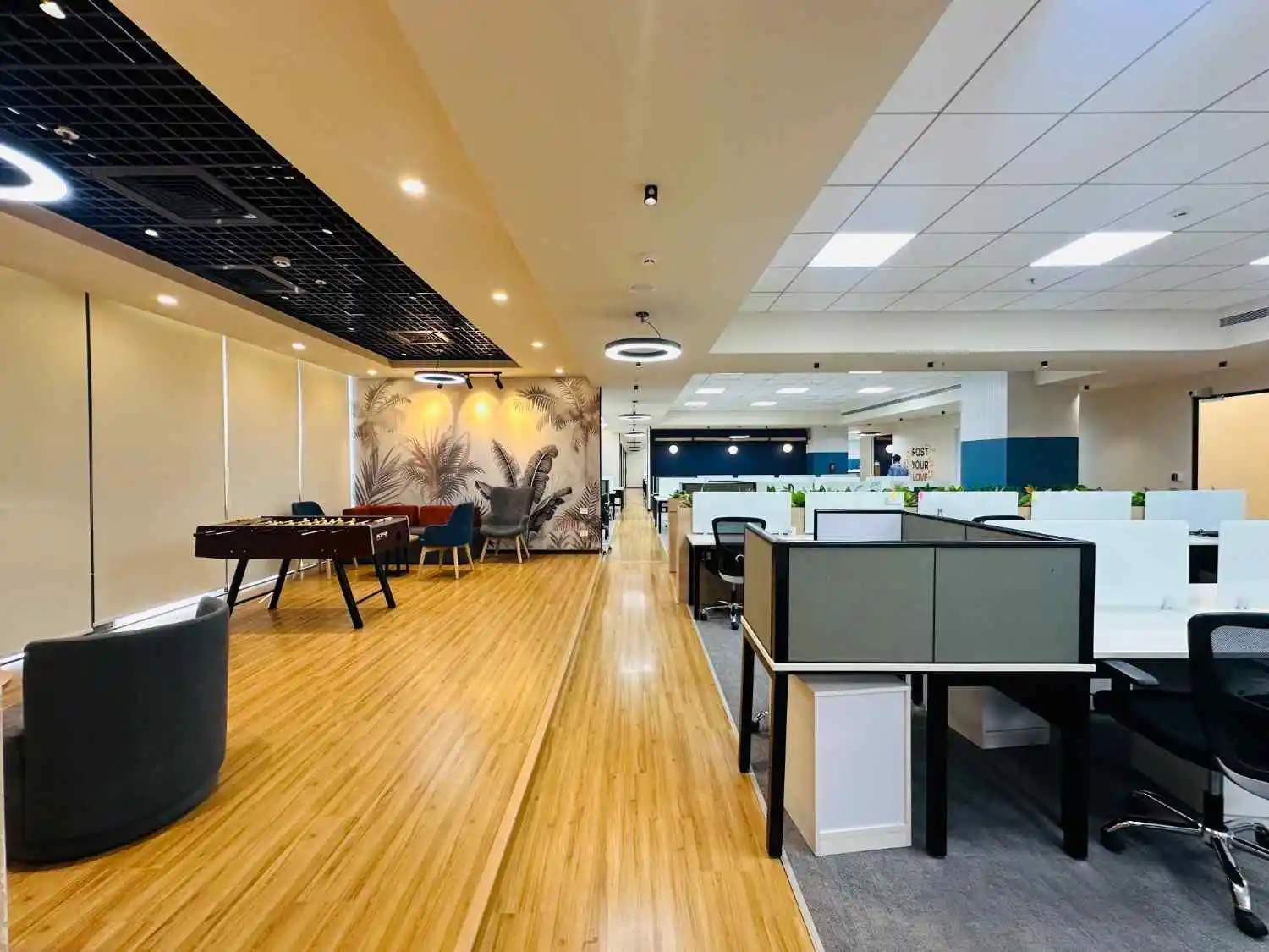 modern office interior with breakout area seating and collaborative workspace design