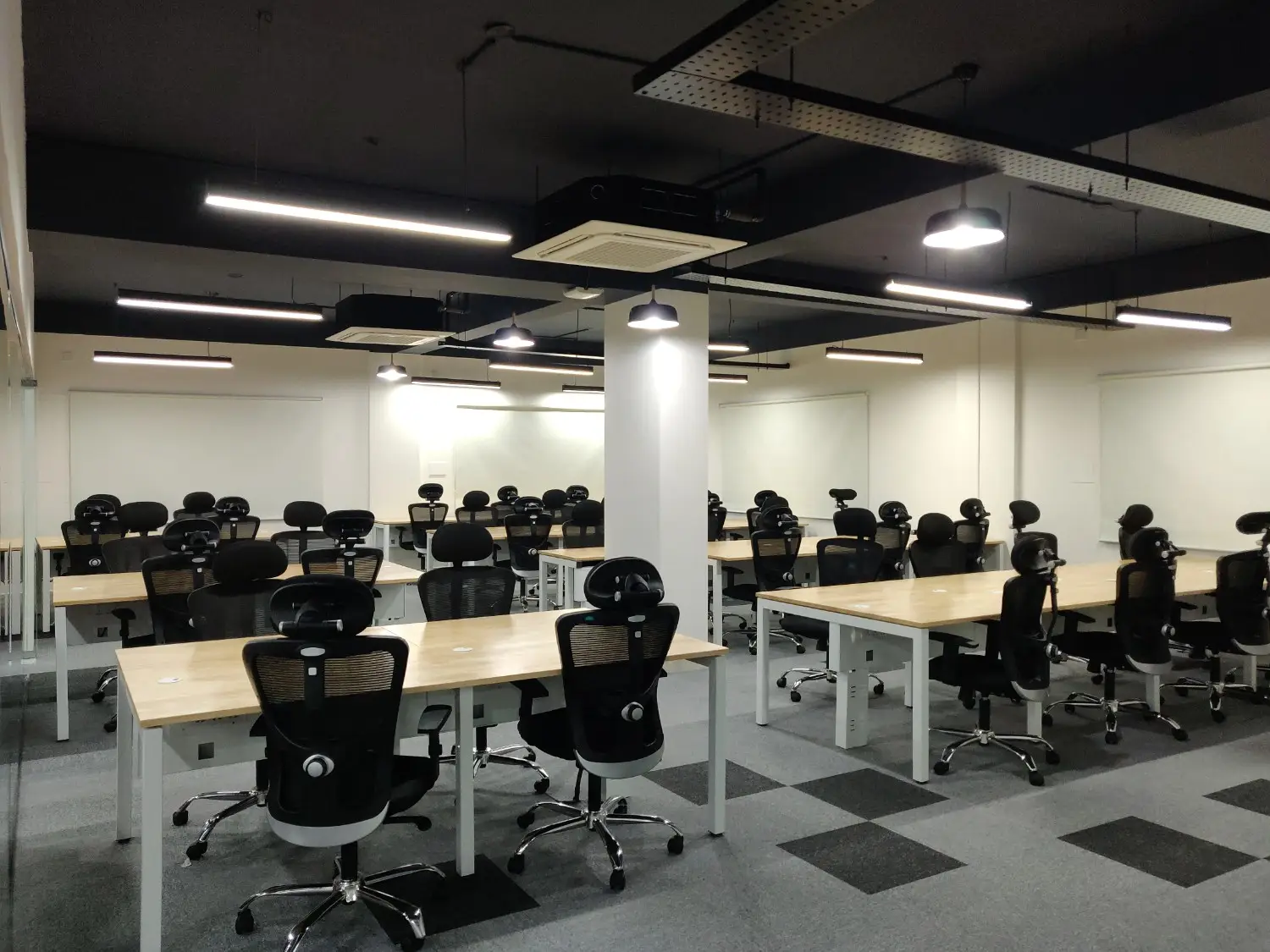 Modern coworking office space in Whitefield Bangalore with open seating and collaborative work environment